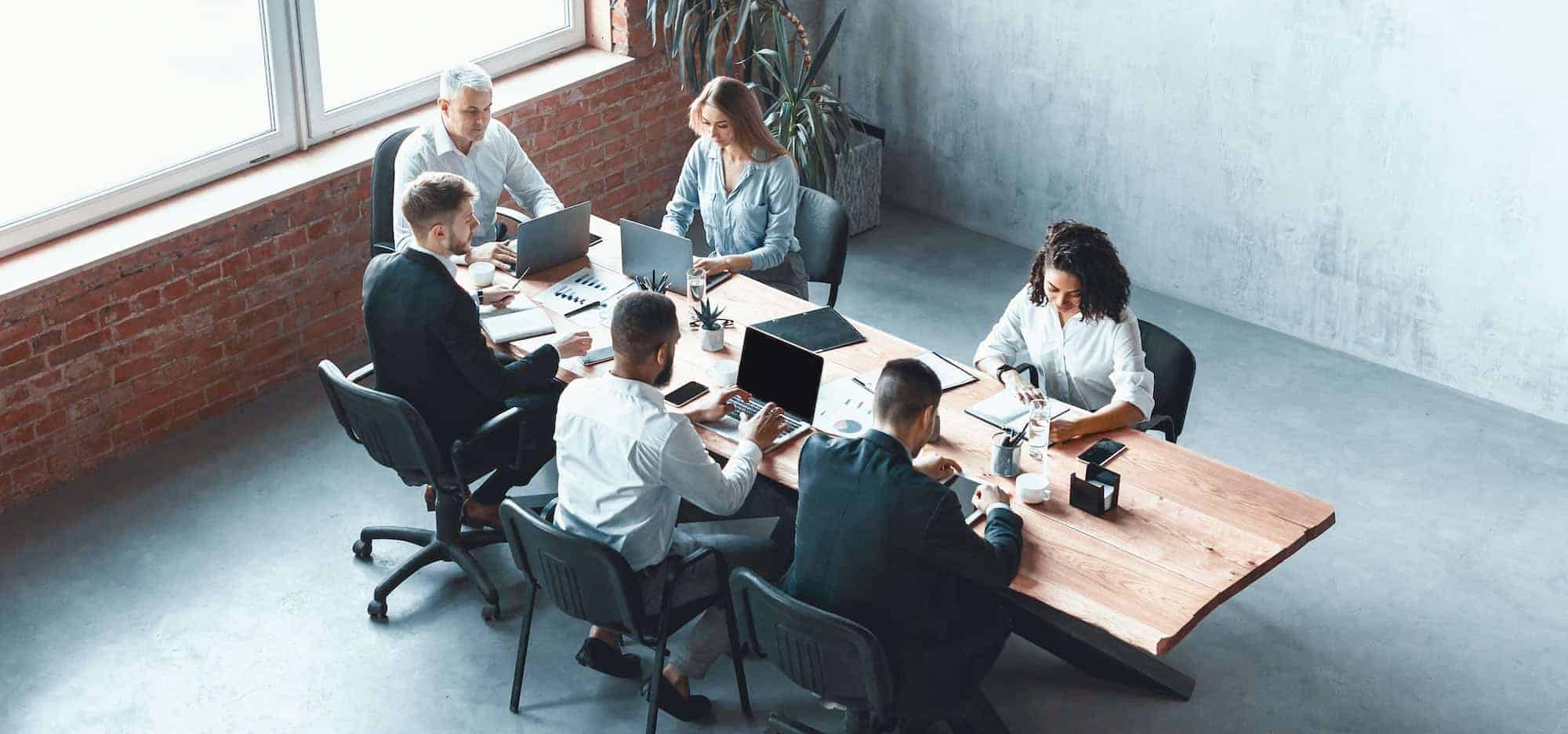 multiethnic-business-team-working-together-sitting-in-modern-office-panorama.jpg - Cut Pro Media Multi Camera Wedding Editing Workflow