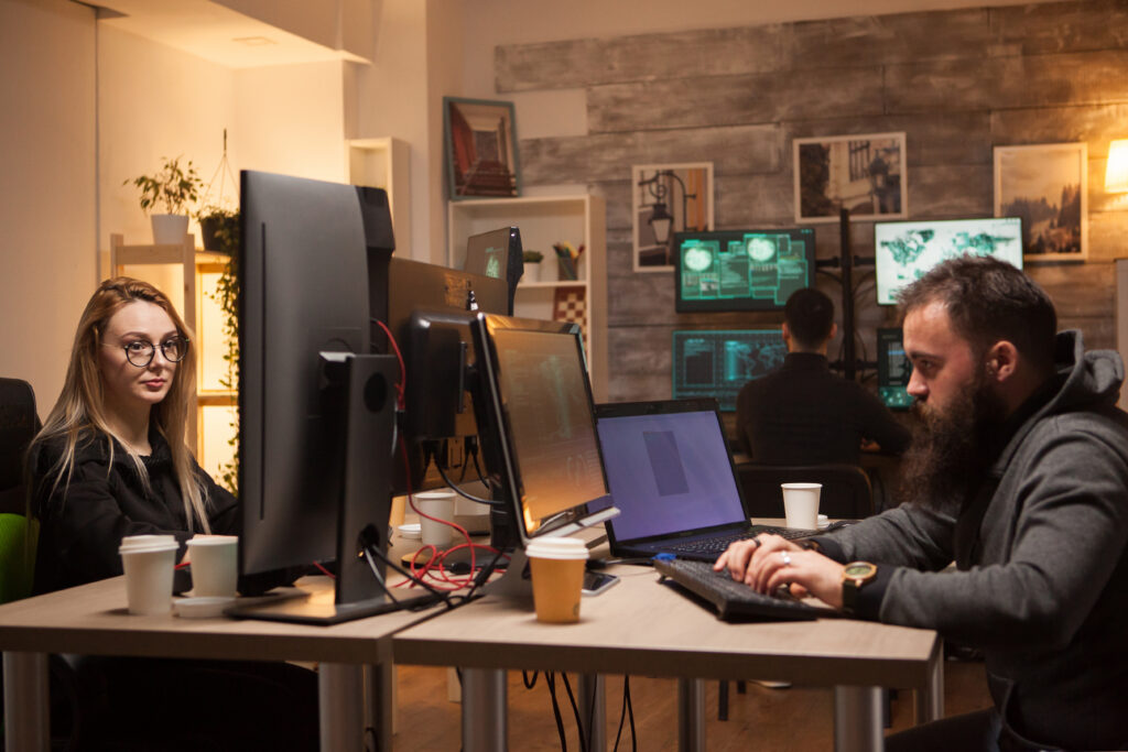 Team of dangerous hackers planning a big cyber attack - Cut Pro Media